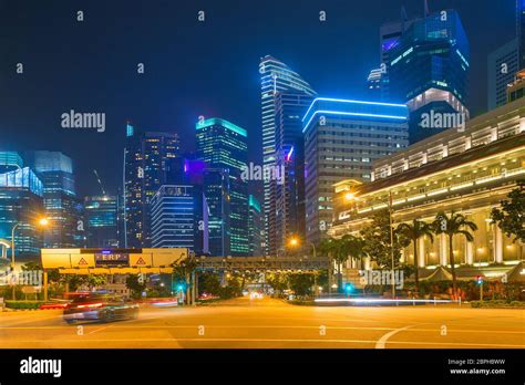 Singapore Downtown Core District Illuminated At Nights Traffic On