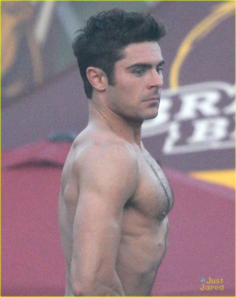 Full Sized Photo Of Zac Efron Sticks Hand In Shorts Flaunts Eight Pack