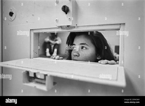 A Young Girl In A Detention Cell At A Juvenile Detention Center The Girl Is A Compensated