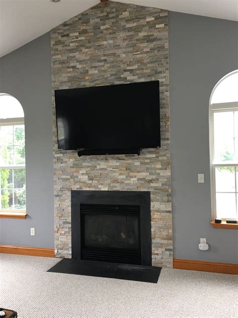10 Floor To Ceiling Stacked Stone Fireplace