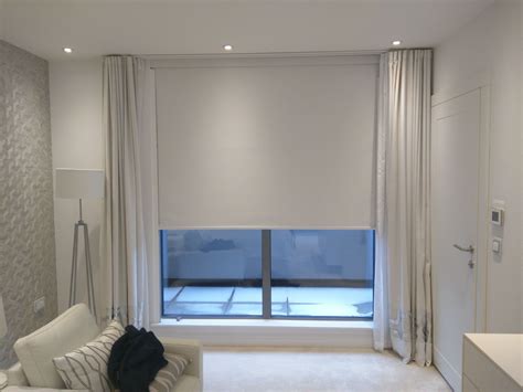 Blackout Roller Blind With Side Tracks Installed To Modern Apartment In