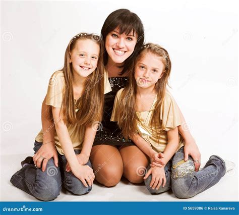 Happy Mother With Two Daughters Stock Photo Image Of Beauty Kids