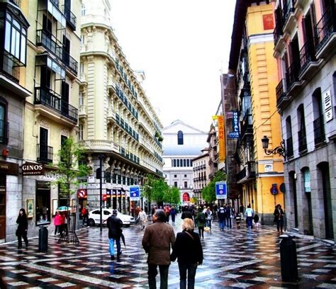 Strolling Through the Calle del Arenal, Madrid, Spain
