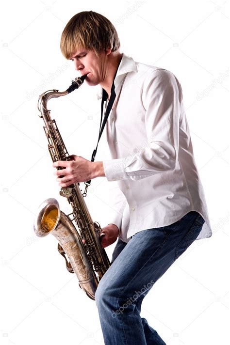 Young Man Playing The Saxophone — Stock Photo © Amoklv 5058242
