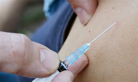 Give Schoolboys Hpv Vaccine Says Charity Society The Guardian