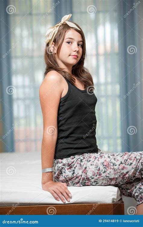 Image Of Pretty Teenager Posing Indoor In A Good Mood Stock Image