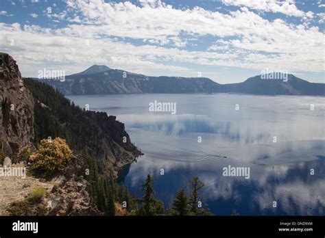 Reflections Showing The Clear Water In Crater Lake Crater Lake