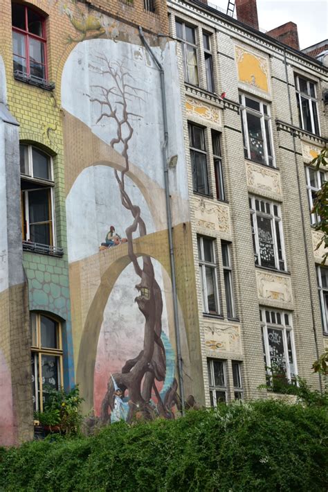 Mural on Tommy Weisbecker Haus in Berlin by various artists