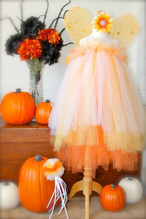 Hand craft a white, orange, and yellow disguise of sweetness with this easy diy candy costume for halloween. Candy Corn Fairy Tutu Dress | Diy tutu, Tutu dress toddler, Halloween costumes to make