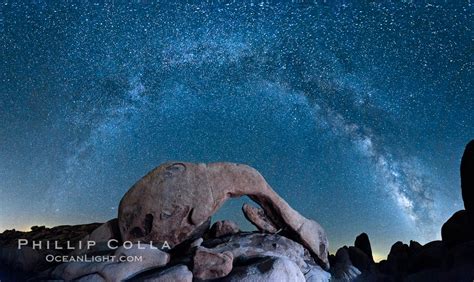 The Milky Way Galaxy Arcs Above Arch Rock Joshua Tree National Park