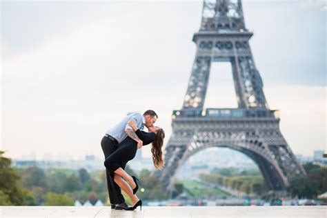 photo of couple in paris at trocadero square engagement photo session in paris with eiffel