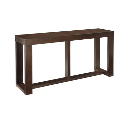 The rustic beauty of the ash veneer is bathed in a dark brown. ashley furniture watson console table in dark brown - t481-4