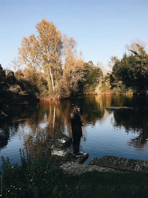 A Beautiful Woman In Front Of Lake Del Colaborador De Stocksy Anna Malgina Stocksy