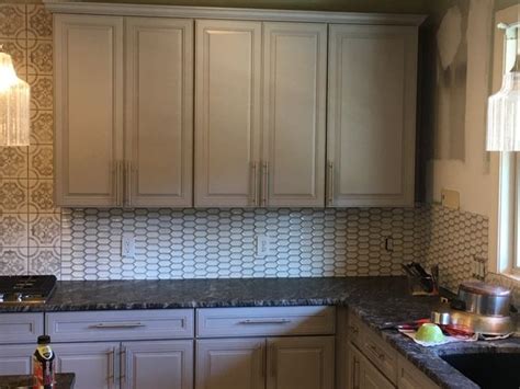 Mask off the interiors with painters' tape for a clean finish and sand only the front surfaces and visible edges of the cabinet face frames. How to paint kitchen cabinets without sanding in 2020 | Kitchen cabinet painters, Refinishing ...