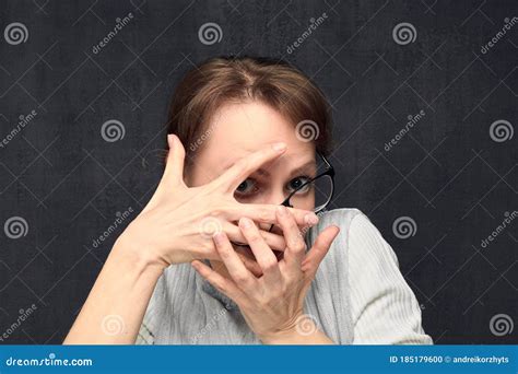 Portrait Of Scared Girl With Skewed Glasses Stock Photo Image Of Gray