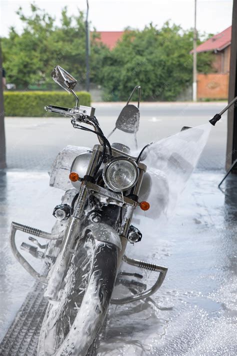 Premium Photo Motorcycle Car Wash Motorcycle Cleaning With Foam