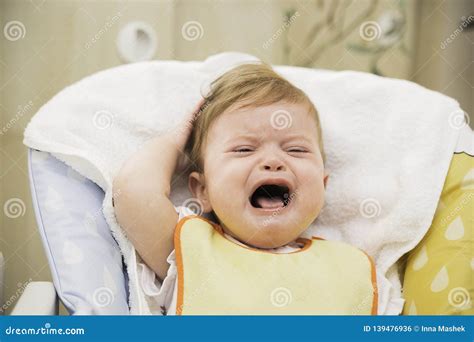 Screaming Crying Baby In A Highchair Stock Photo Image Of Girl