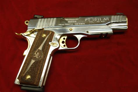 TAURUS HIGH POLISH STAINLESS W/GOLD ACCENTS 191... for sale