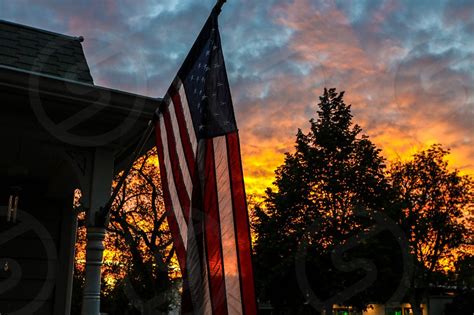 American Flag At Sunset By Jonathon Bade Photo Stock Studionow