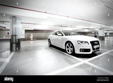 White Sports Car Parked In The Underground Garage Stock Photo 35549373