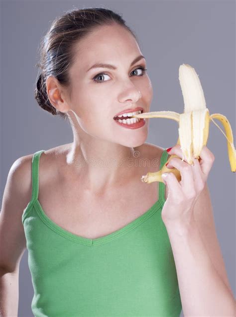 Charming Woman Eating A Banana Stock Photo Image Of Healthy
