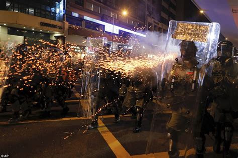Riot Police Fire Tear Gas At Protesters In Hong Kong On Another Night