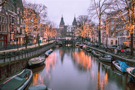 Best Photo Spots In Amsterdam Brunette At Sunset