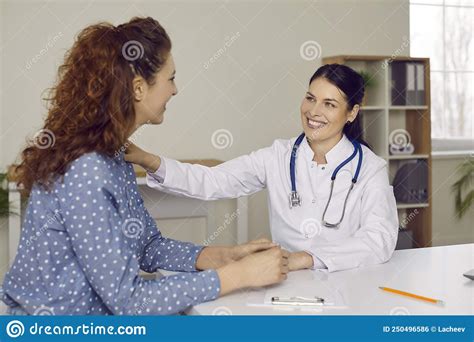 Doctor Touches Patient S Shoulder Telling Her Good News During