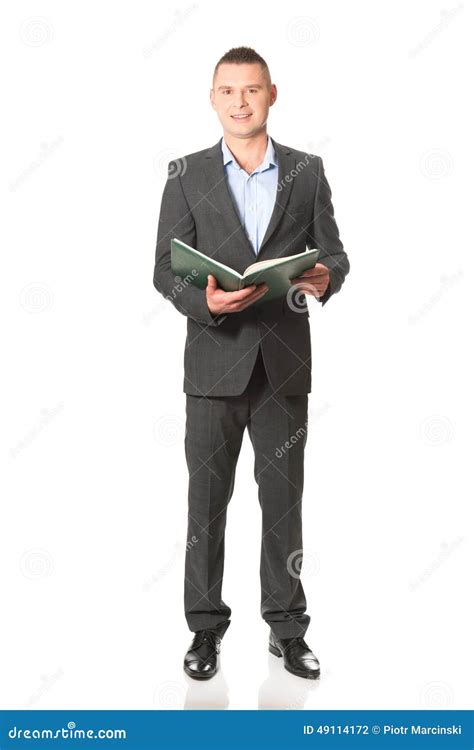 Young Businessman Reading His Note Book Stock Photo Image Of Concept