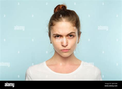 Emotion Frowning Face Grumpy Pursed Lips Woman Stock Photo Alamy