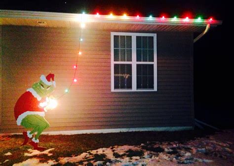 Grinch Stealing Lights Christmas Decorations