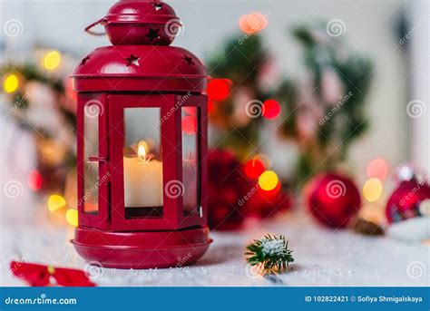 Red Christmas Lantern On White Background With Fir Branches And Lights