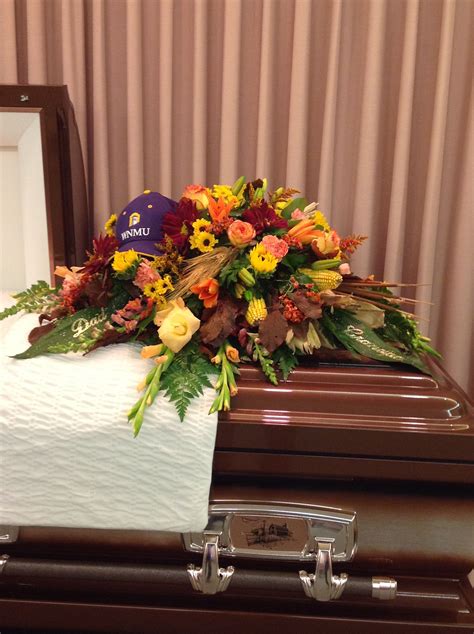 Fall Flowers Are Just The Right Choice For A Mans Funeral Added Touch