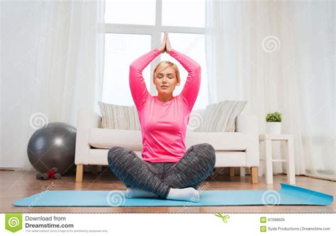 Happy Woman Stretching Leg On Mat At Home Stock Image Image Of Exercising Girl 67098609