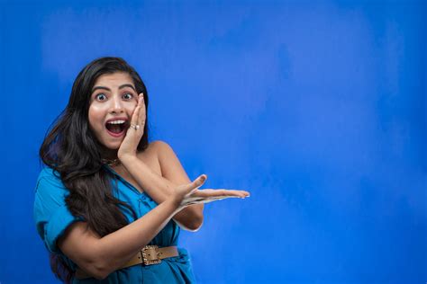shocked indian girl on blue background pixahive