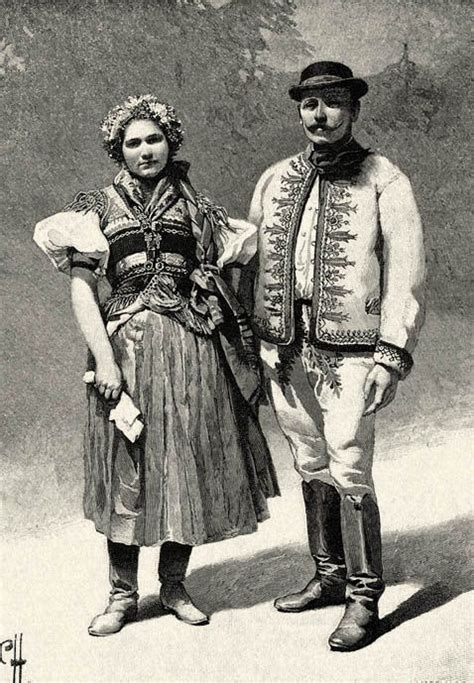 An Old Black And White Photo Of Two People Dressed In Historical