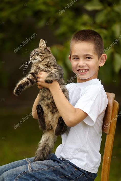 Funny Boy With Cat Stock Photo By ©ababaka 118419386