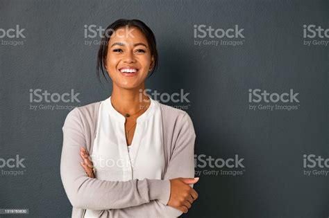 Portrait Of Smiling Mixed Race Woman Looking At Camera Stock Photo