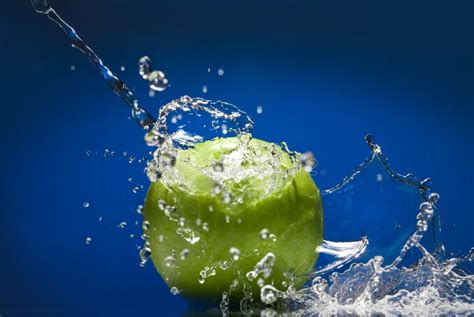 Splash Serie Green Apple With Blue Background Stock Image Image Of