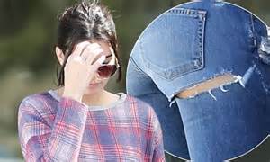 kendall jenner flashes more than intended in jeans with a tear daily mail online