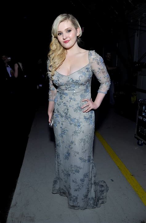 Abigail Breslin Showing Huge Cleavage In A Partially See Through Lace