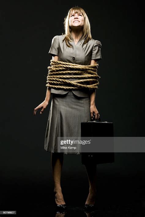 Businesswoman All Tied Up With Ropes High Res Stock Photo Getty Images