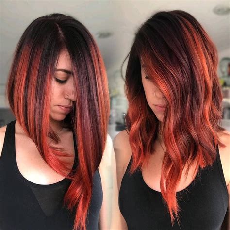 Angled Bob Haircut With Rich Orange High Lights Haarfarbe Schwarz
