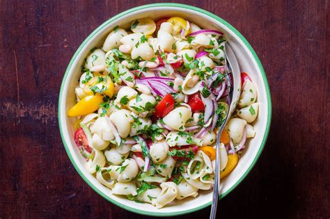 You can never have too many salads over the summer, and this one is both easy to make and great to bring to a potluck as a side dish. Pasta and Bean Picnic Salad Recipe | Picnic salad recipes ...