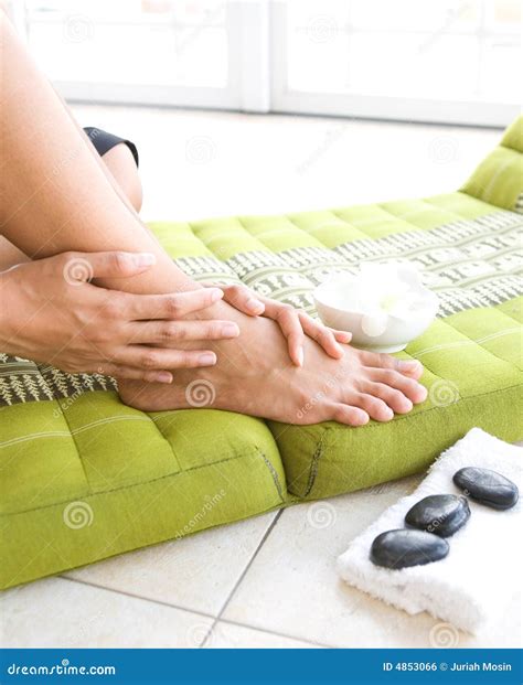 Two Feet Pampering Pedicure Wash In A Specialized Foot Spa With Massage Effect Stock Image