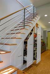 I love this design where the stairs seamless offer both steps and display shelves. 11 Great storage ideas for the wasted space beneath your stairs