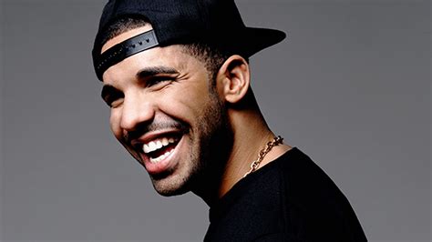 Smiley Drake Is Wearing Black Dress And Cap And Gold Chain On Neck Hd
