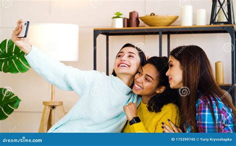 Smiling Multiracial Female Friends Taking Selfie Photo At Home Stock Image Image Of Gadget