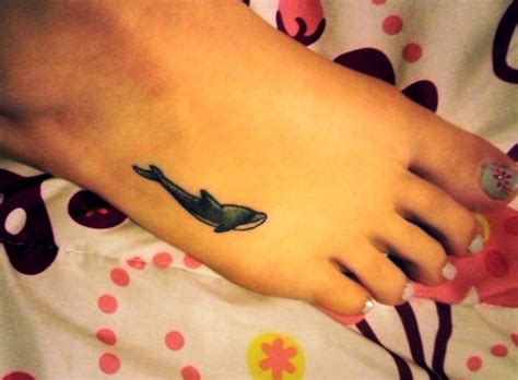 19 Awesome Dolphins Tattoos For Foot