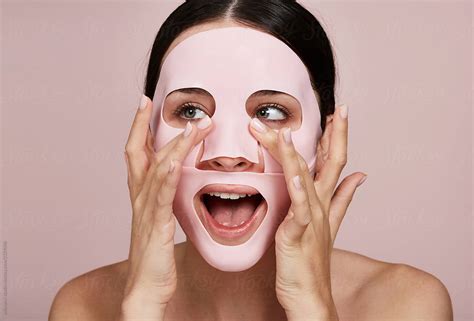 Stunning Woman Using Gel Facial Mask By Stocksy Contributor Ohlamour